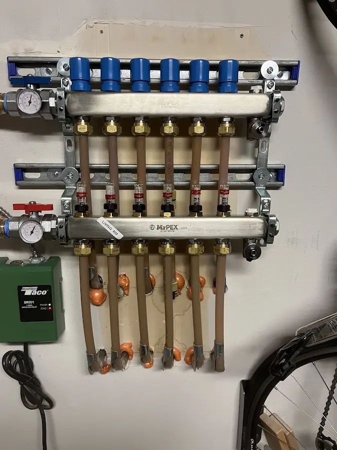 Plumber performing Water Heater Repair at a residential property in Thatcher